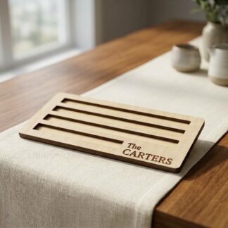 Maple domino holder engraved with a family name