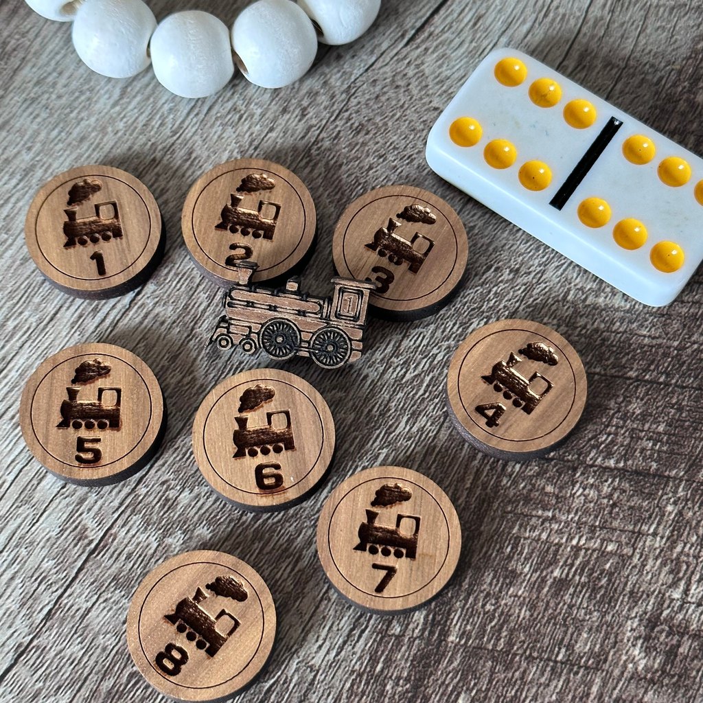 Numbered wooden train tokens